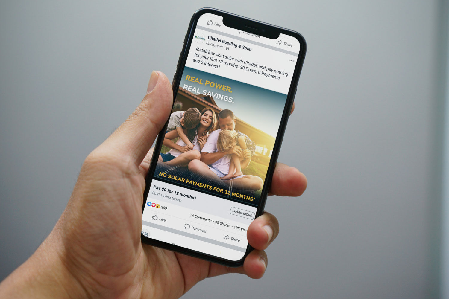 Man holding iPhone X